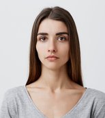 Face undergoing deepfake analysis &mdash; code panel
