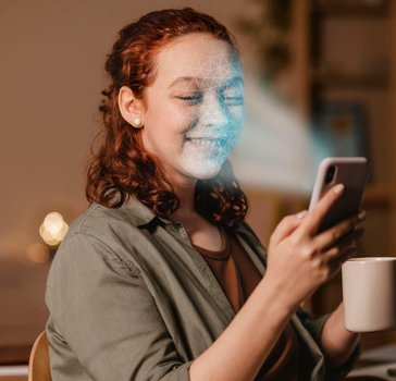 Woman with phone doing face scan &mdash; passive liveness preview