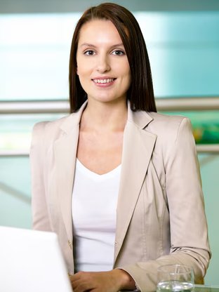 Businesswoman with laptop &mdash; home hero
